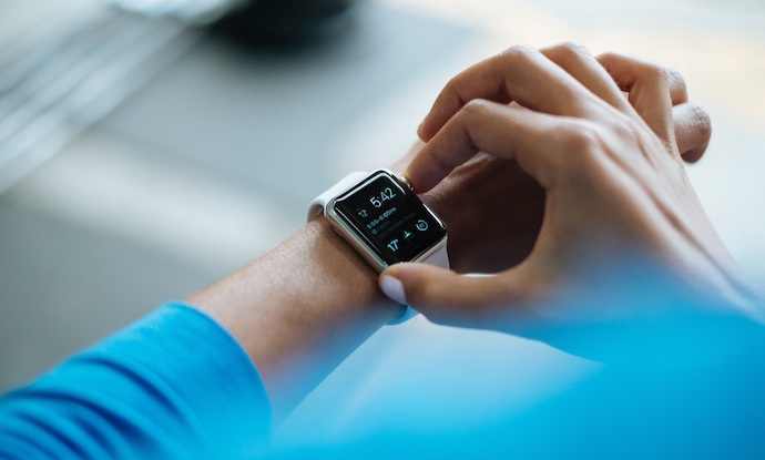 closeup woman checking smart watch